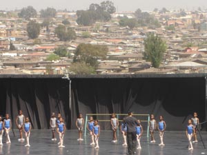 Against the backdrop of Alexandra: the children of the Ballet Theatre Afrikan Alexandra Academy are put through their paces by teacher Alexie Illin