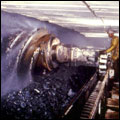 Continuous miner in operation in a coal mine