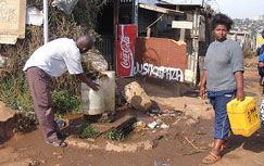 Communal tap in Soweto sanitation, drinking water, toilet, flush toilet, bucket system, pit latrine, water 
and sanitation