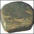 Boulder engraving depicting antelopes - the European couple was added later