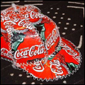 Peaked cap made out of Coca-Cola cans