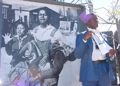 Sam Nzima with his famous photo of a dying Hector Pieterson 
