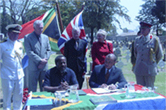 Pallo Jordan and Paul Boateng signing the memorandum of understanding on Boer War graves Pallo Jordan and Paul Boateng signing the memorandum of understanding on Boer War graves