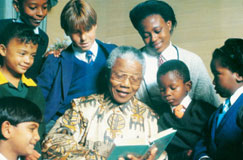 Nelson Mandela reading to schoolchildren Nelson Mandela reading to schoolchildren