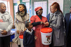 Food parcel handout gets Mandela Month under way 