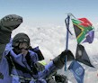 Wisedale flies the South African and Discovery flags from the top of Everest